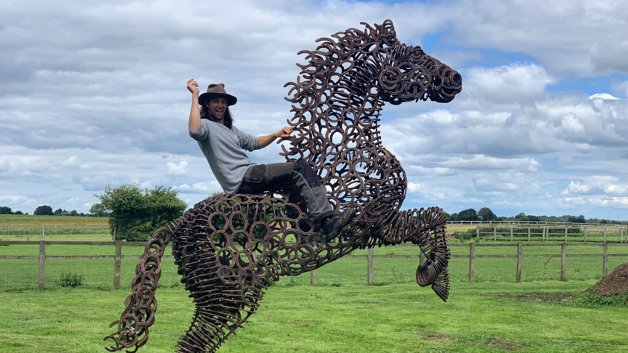 Man riding horse sculpture