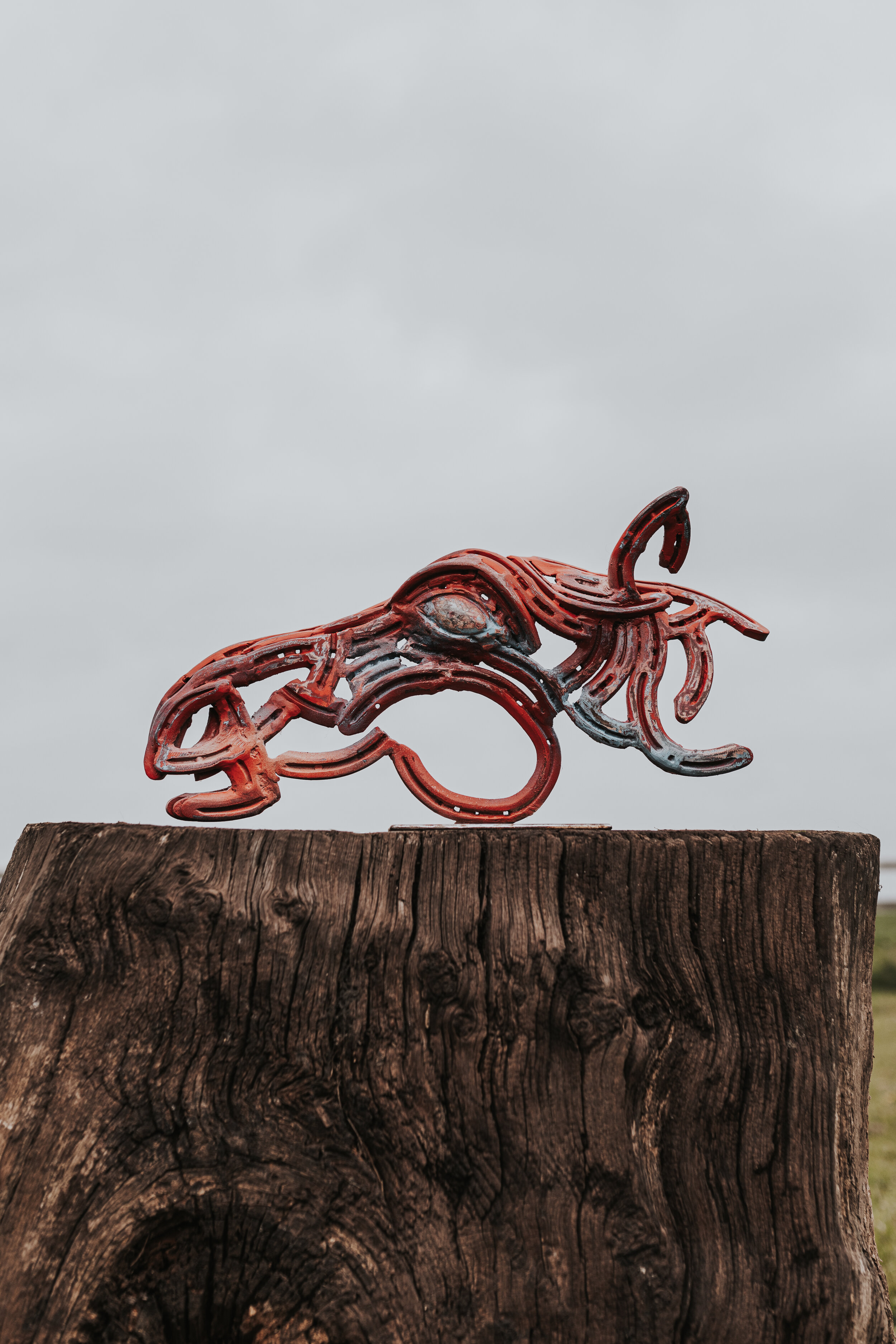 small horseshoe horse sculpture