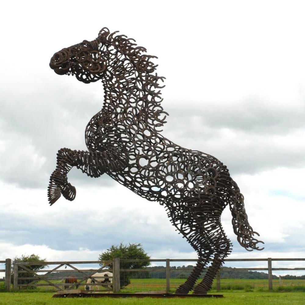 A lifesize horse made entirely from horseshoes.