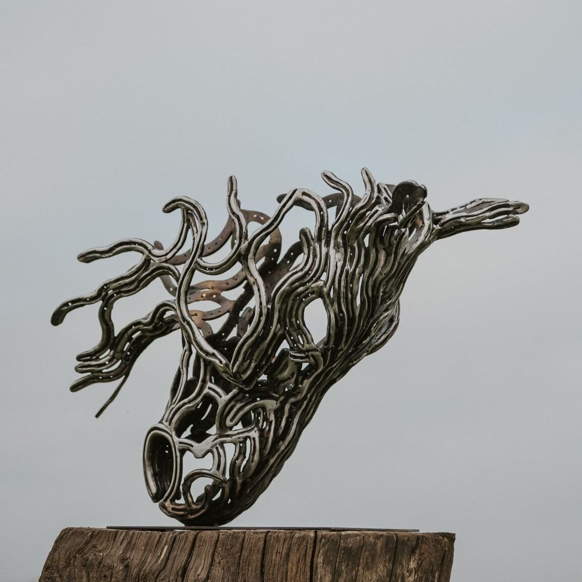 Steel Horse sculpture made from horseshoes,