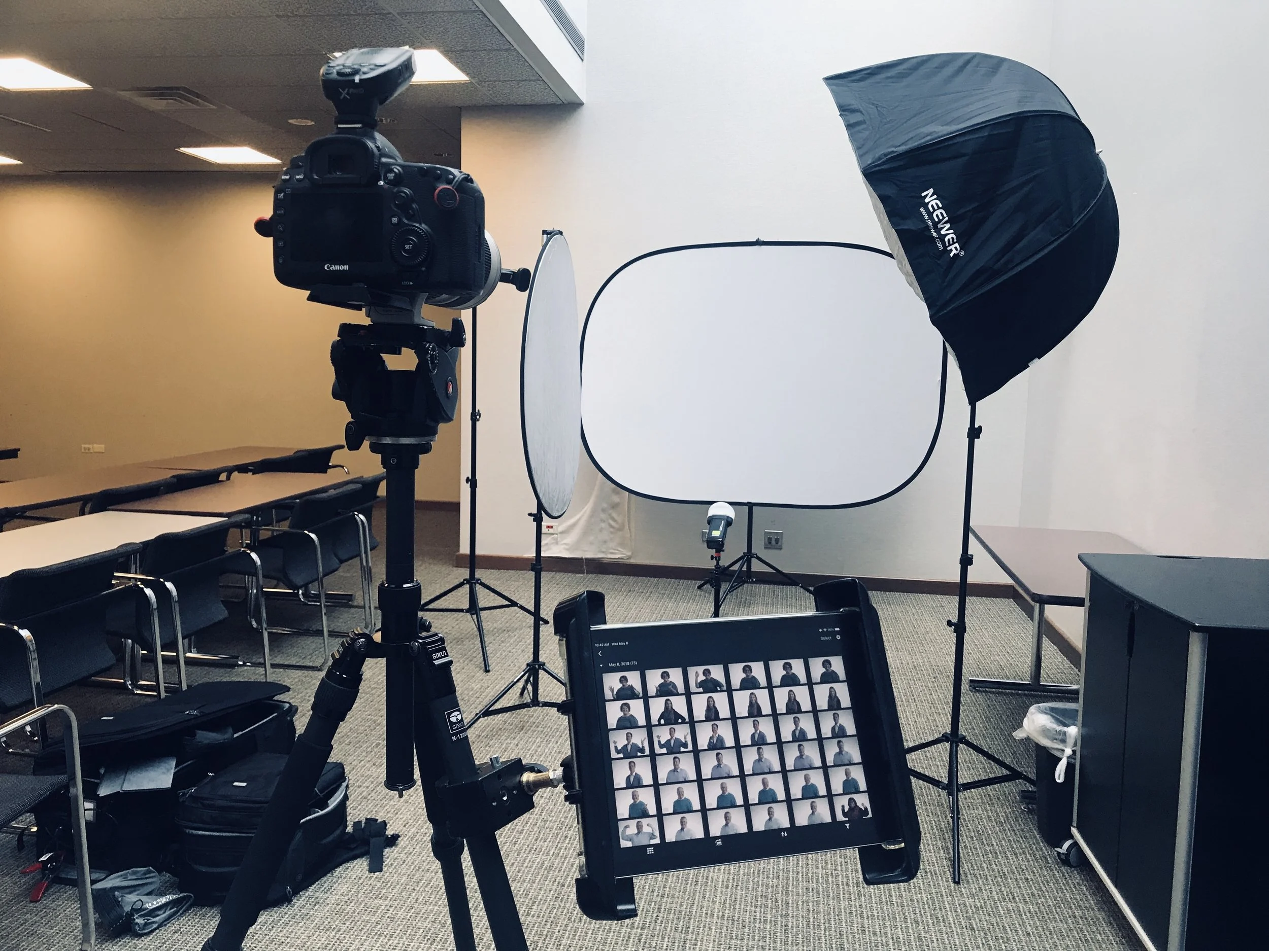 We loved having so much space! This conference room allowed us to use a more flattering lens for portraits. This setup uses traditional 3 point lighting, as well as an iPad which is updated after each shot so individuals can review and mark which photo they like best. This streamlines post-production process allows us to deliver the images faster.