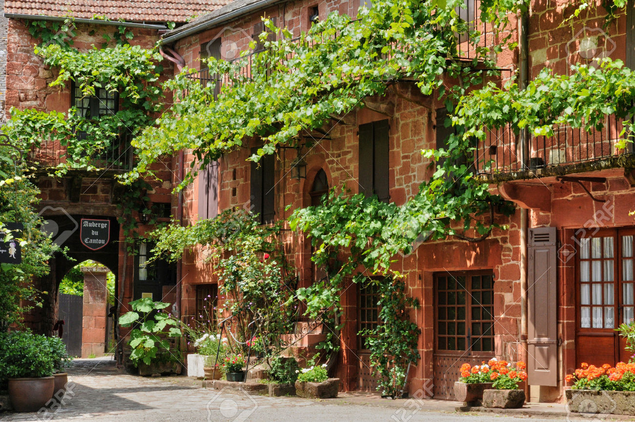 23509215-France-the-picturesque-village-of-Collonges-la-Rouge-Stock-Photo.jpg