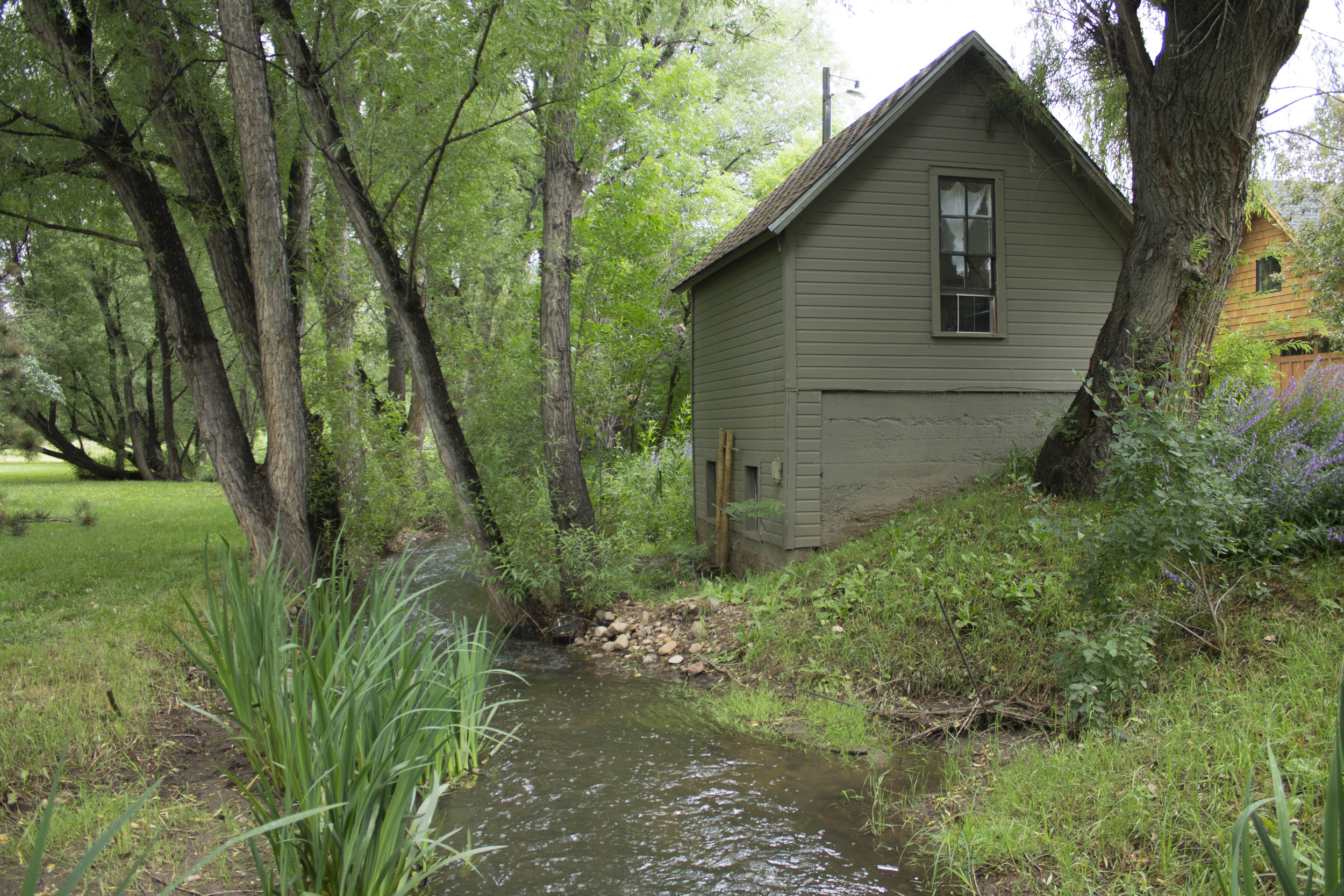 The "studio" residence along the creek.
