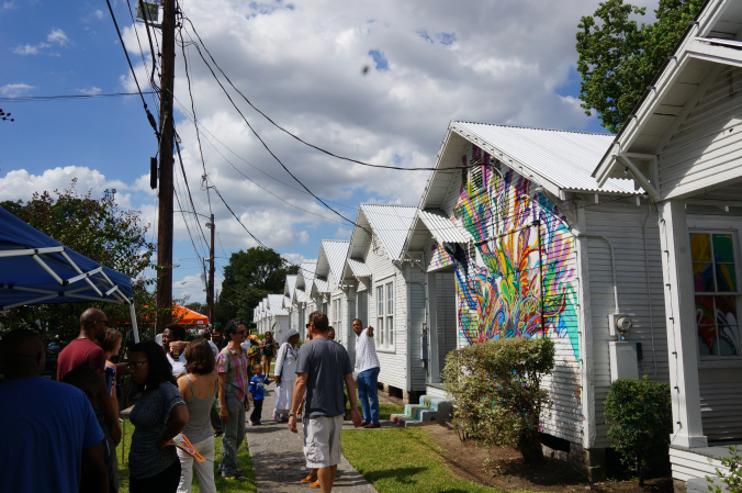 Project Row Houses is an art project integrated into the underserved African-American community of the 3rd ward in Houston, TX. PRH offers public arts programming, resource directories, a single mom’s program, collaborates with Rice Universities Architecture program, and more. Find out more: http://projectrowhouses.org.