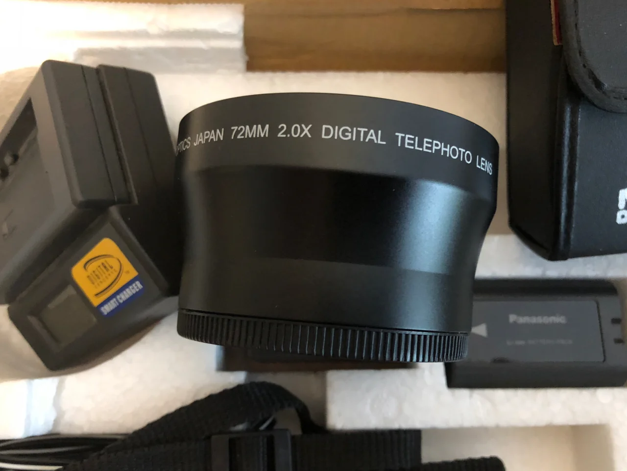 Extra lens, batteries & charger