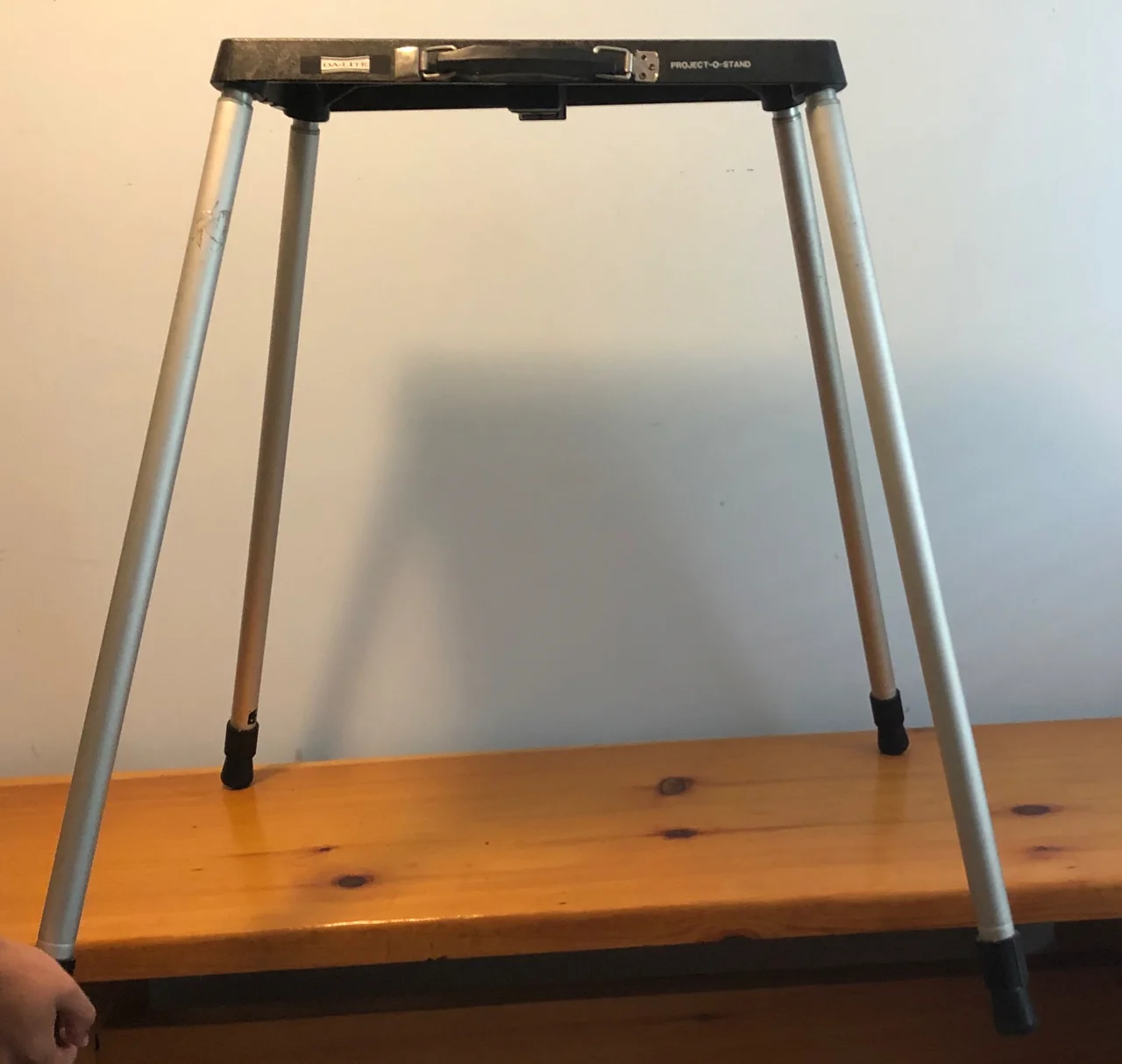 Portable stand; folds flat