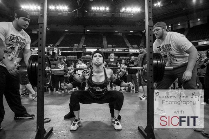 Coach Jessica squatting some big weight at the SacTown Throwdown
