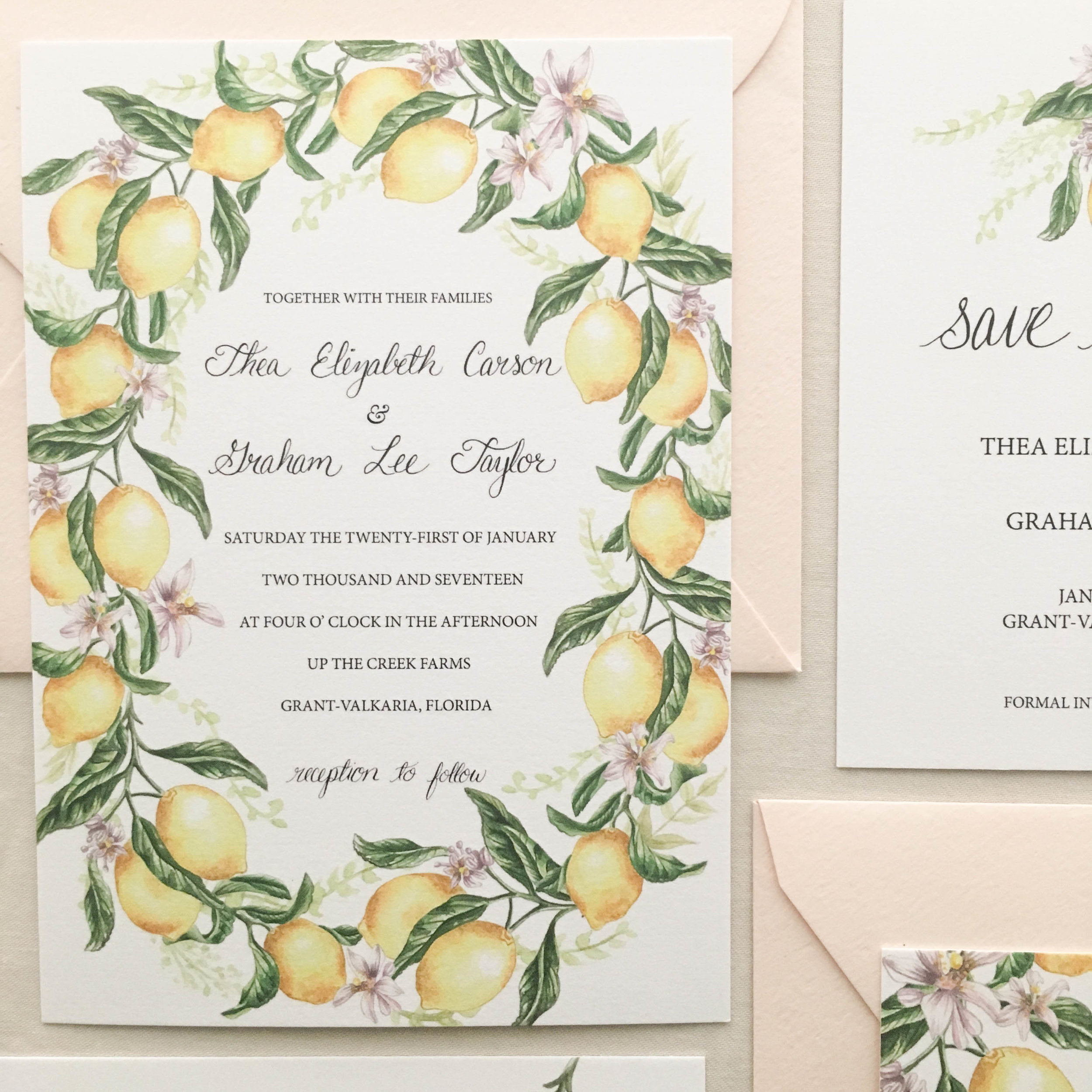  The 'Citrus Wreath Suite' is a bright, lemon yellow citrus wreath design that is classic yet modern. Hand-painted lemons dance around a luxurious cotton paper invitation. 