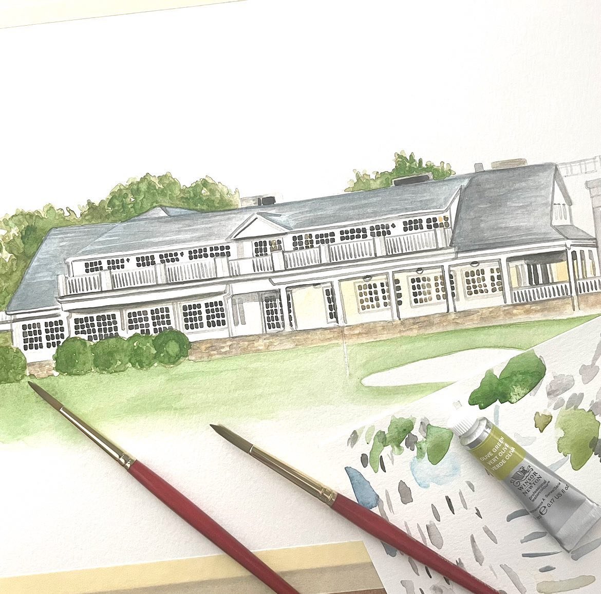 Progress on a custom wedding stationery piece! I use very tiny brushes to get the details of the windows on this architectural watercolor of a country club!