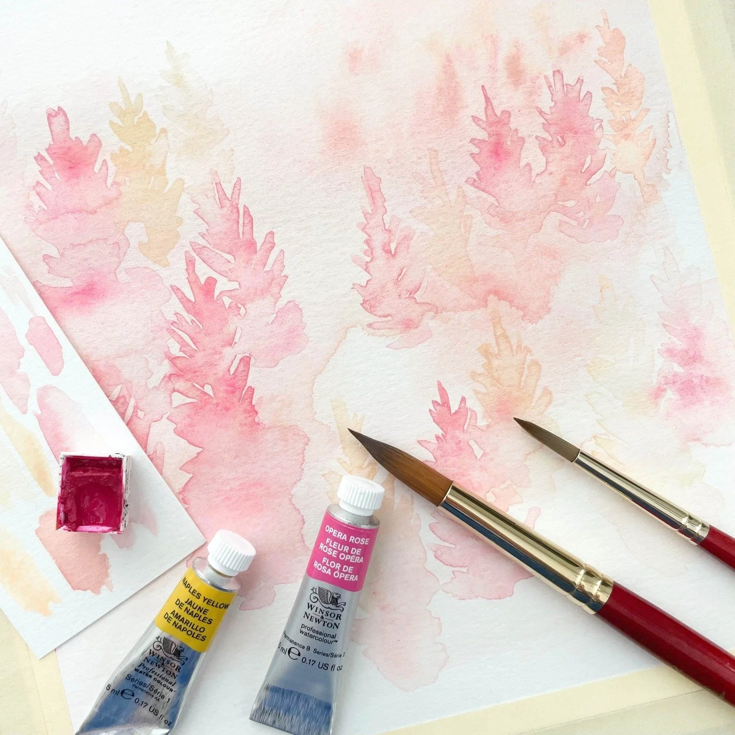 Coral and cream meld together in loose watercolor layers for another foggy forest painting 🌲