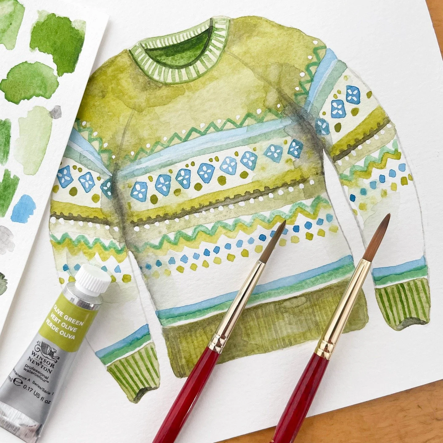 It is officially sweater weather and this cozy green watercolor holiday sweater has a fun and funky pattern! 🍁