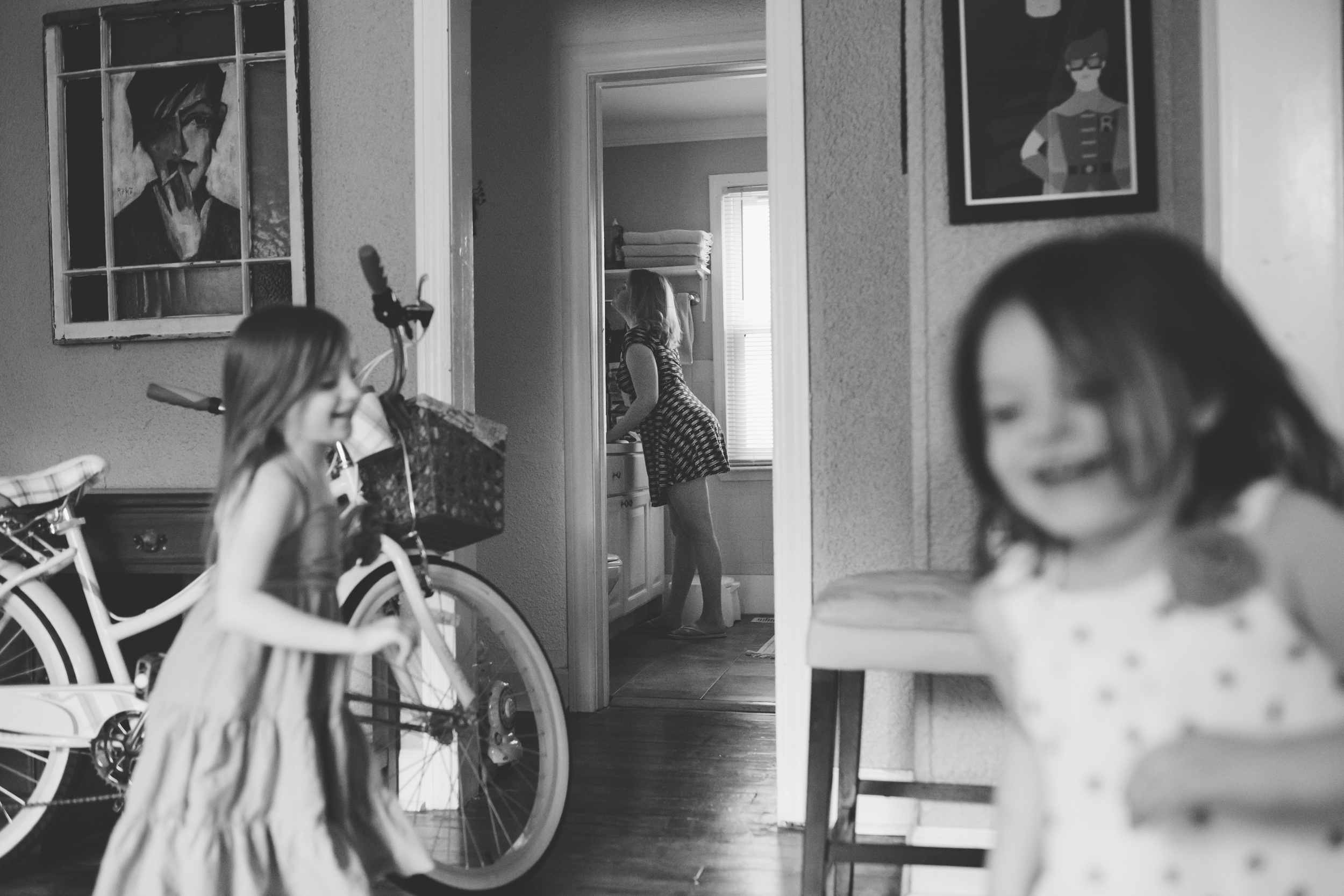 Two girls running in circles.