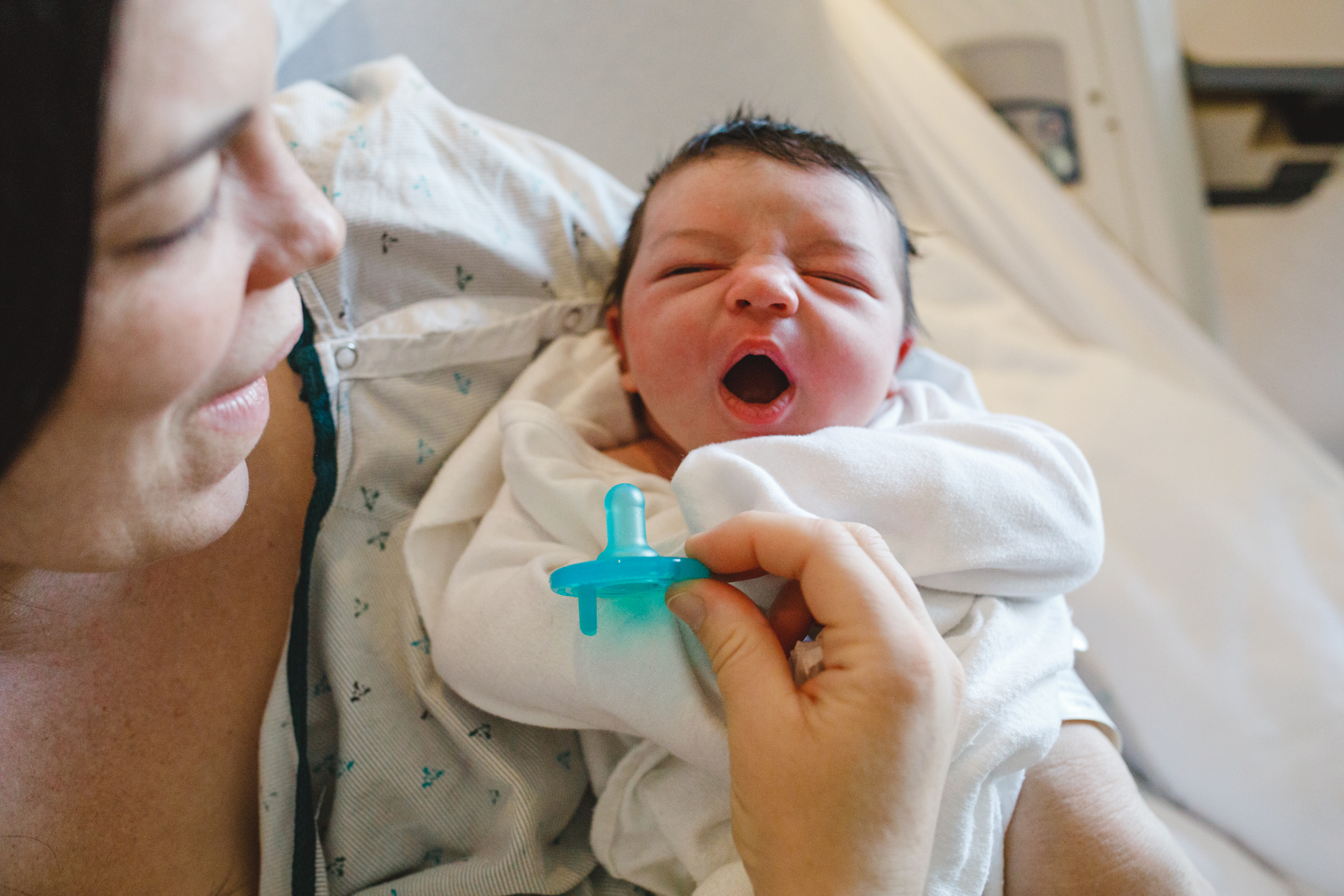 New baby making funny face.