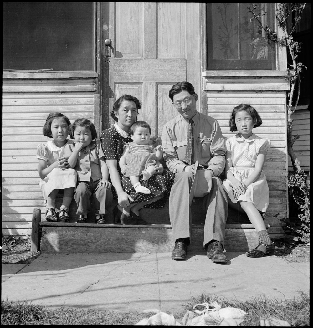  Mountain View, California. Henry Mitarai, age 36, successful large-scale farm operator with his family on the steps of their ranch home, about six weeks before evacuation. This family, along with others of Japanese ancestry, will spend the duration 