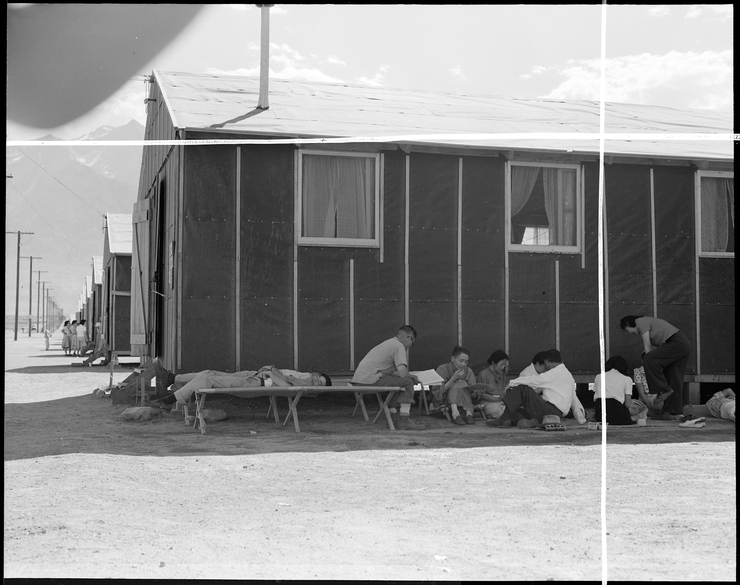 Manzanar Relocation Center, Manzanar, California. Evacuees at this War Relocation Authority center . . .