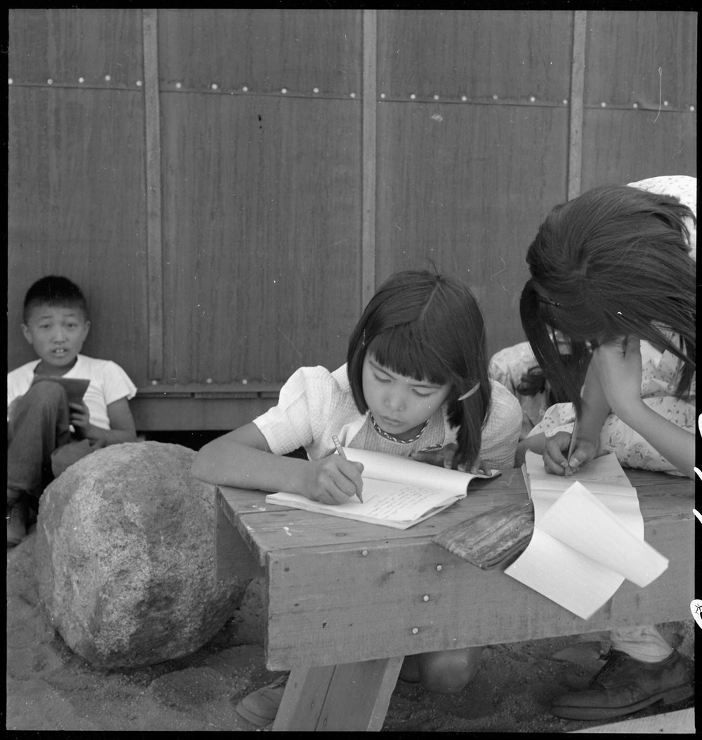  Manzanar Relocation Center, Manzanar, California. An elementary school has been established with volunteer evacuee teachers, most of whom are college graduates. Attendance at this time is voluntary. No school equipment is as yet available and availa