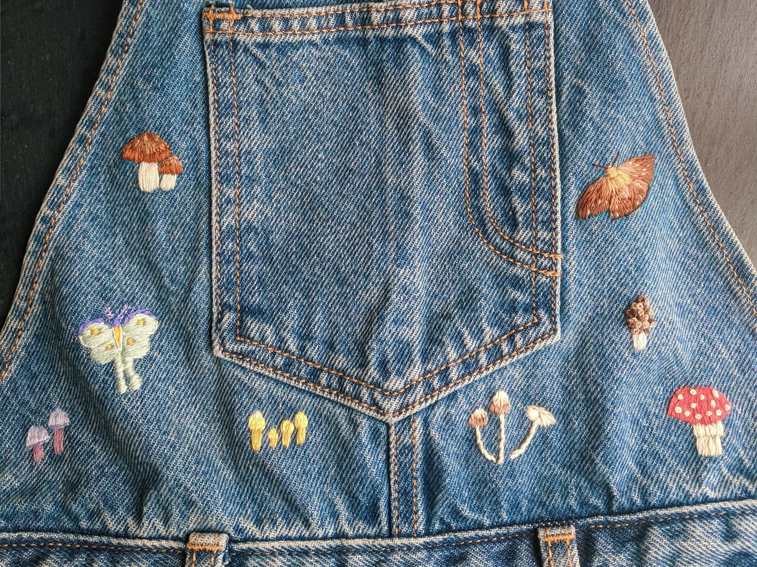 Moths and Mushrooms on My Overalls, Not for SalE. If you want me to embroider all over any clothing items you have, Check out the Clothing commissions page!