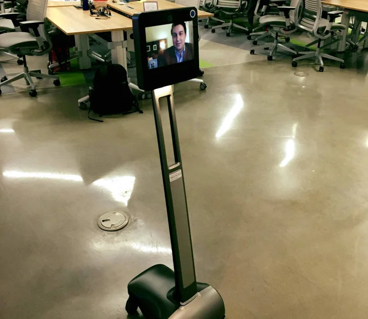 MAGA DESIGN'S JOHN GRAY PARKER, WHO WAS OUT OF TOWN, STILL MADE IT TO THE EVENT BY SCURRYING AROUND ON A TELEPRESENCE ROBOT!