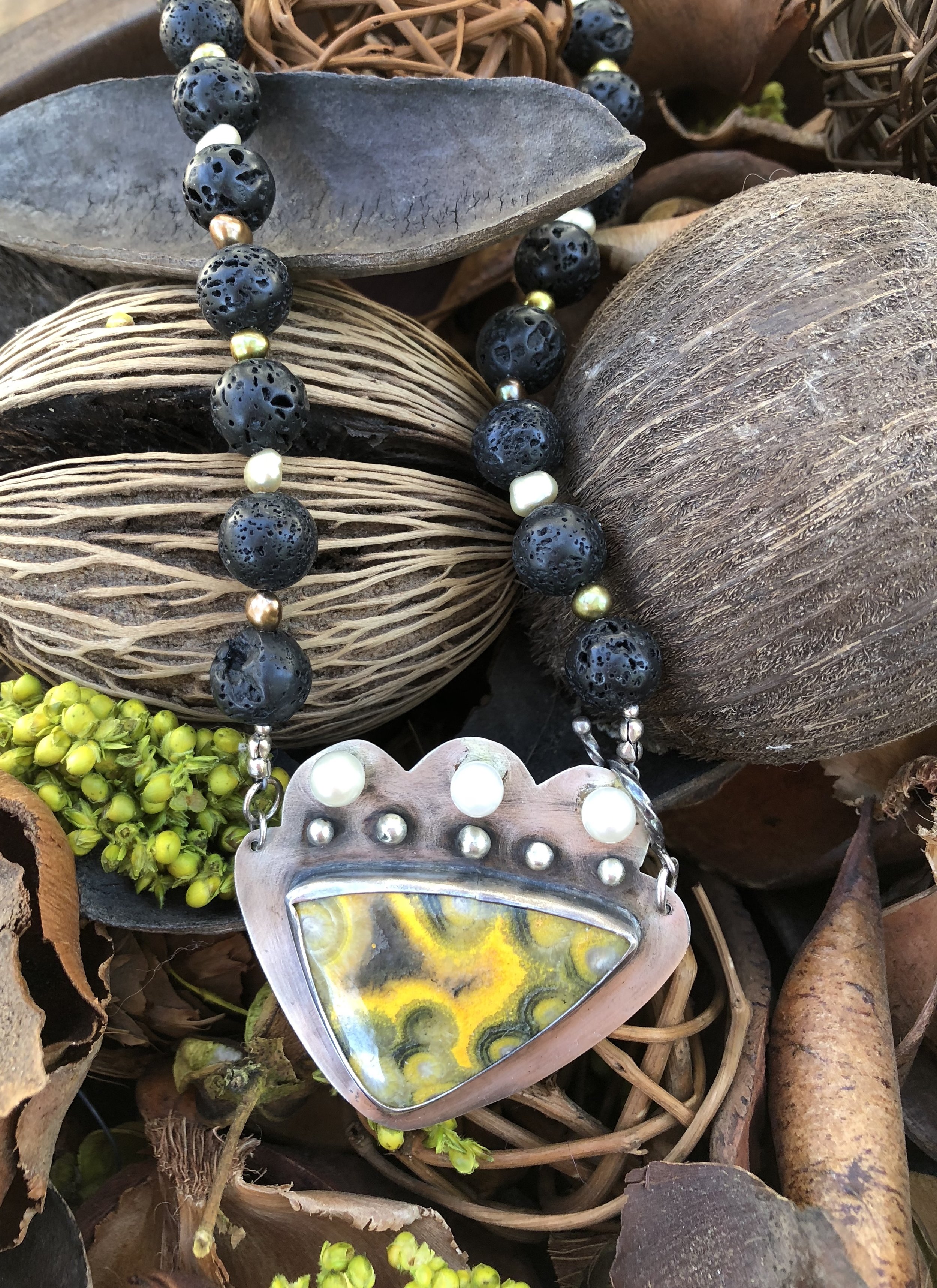 bumble bee jasper and lava bead necklace