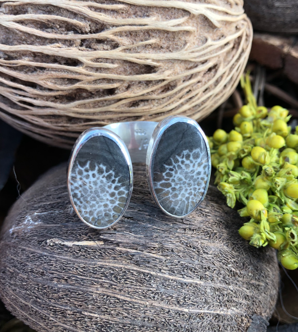 black and white fossilized coral ring