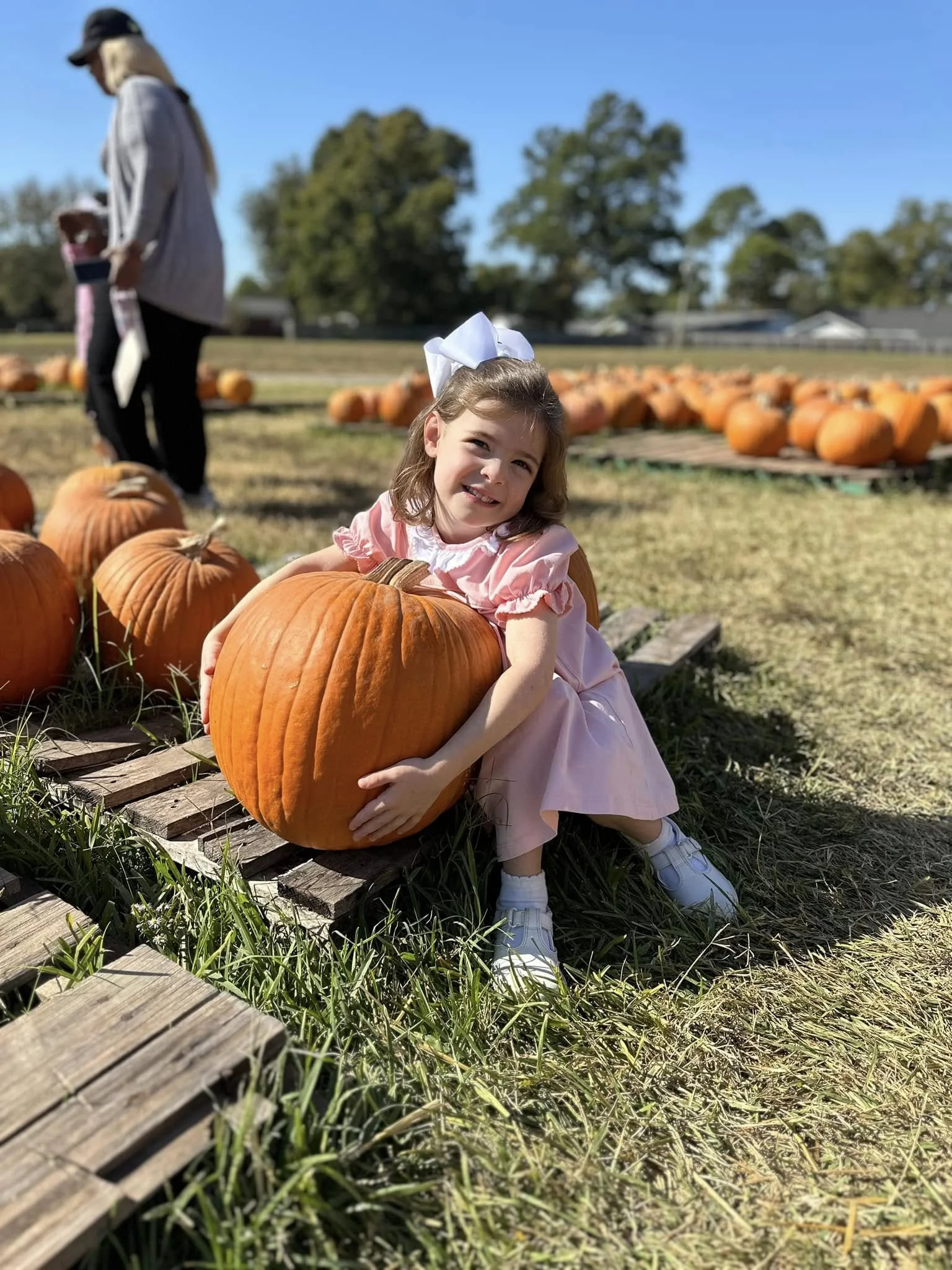 girl with pumpkin.jpg