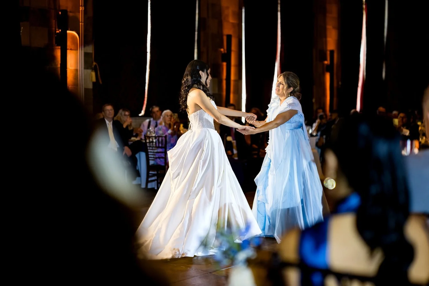 The Society Room of Hartford wedding videographer, Hartford, CT â€” bride dancing on the ballroom floor beneath the marble columns and mezzanine balcony