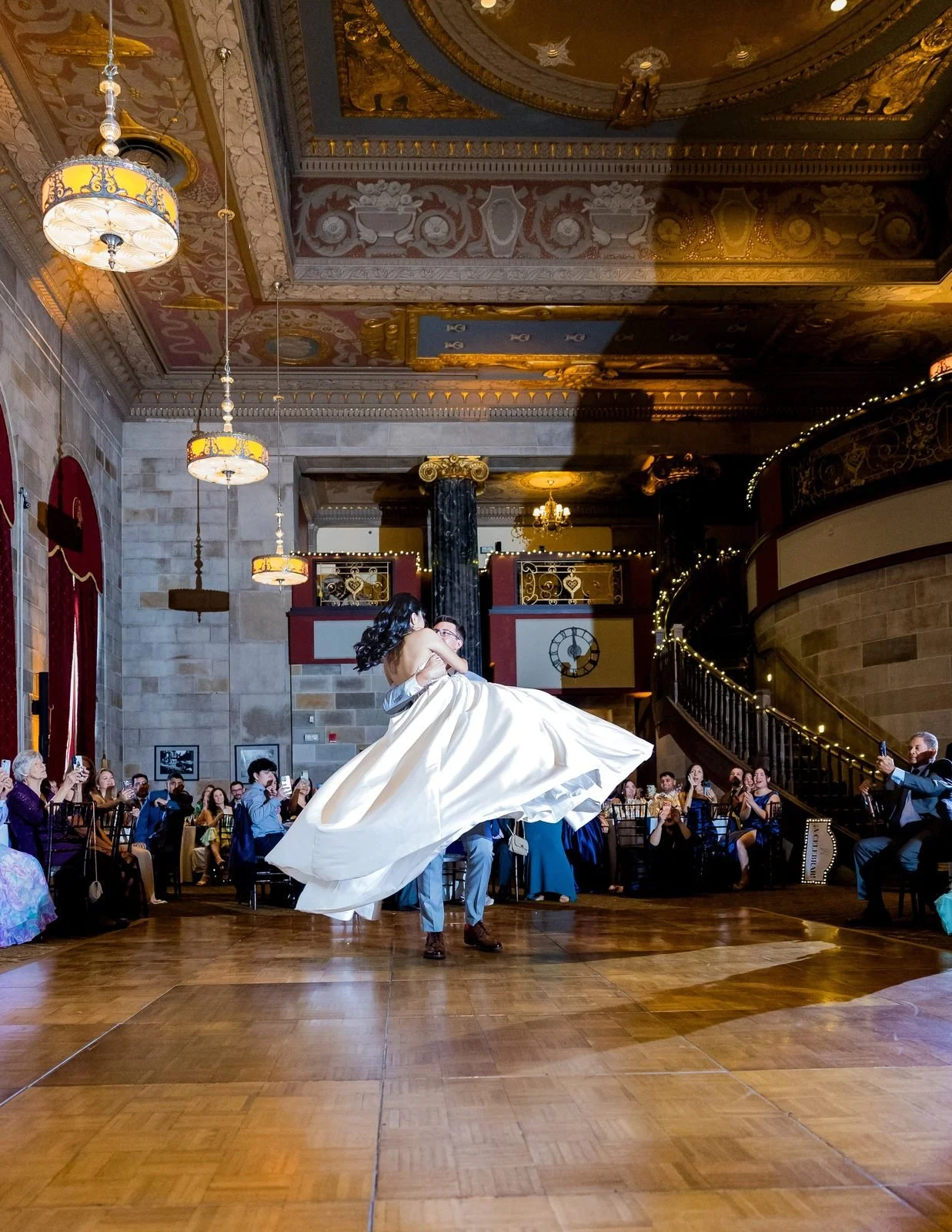 The Society Room of Hartford wedding videographer, Hartford, CT â€” grand entrance twirl on the dance floor beneath the gilded, muraled ceiling and crystal chandeliers