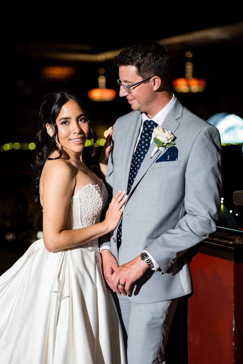 The Society Room of Hartford wedding photographer, Hartford, CT â€” warm evening portrait of the bride and groom in the lounge glow