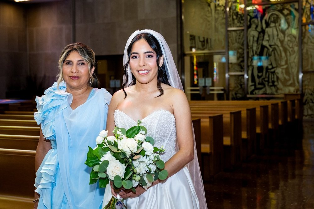 The Society Room of Hartford wedding videographer, Hartford, CT â€” bride and her mother sharing a moment in the church before heading to the Society Room