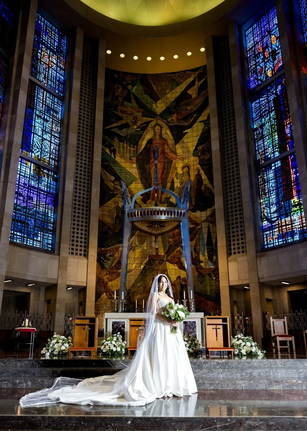 The Society Room of Hartford wedding photographer, Hartford, CT â€” bride beneath towering stained glass and a mosaic altar before the reception