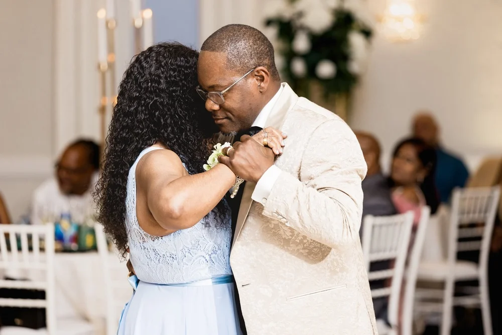 Avenir wedding photographer, Walpole, MA — parent dance at the reception with guests watching from the white chairs