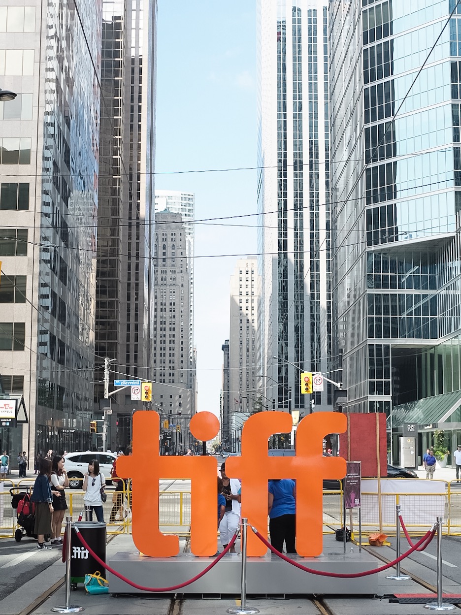 The iconic TIFF sign rests at the same spot each year but there is always a lineup to take a photo with it.