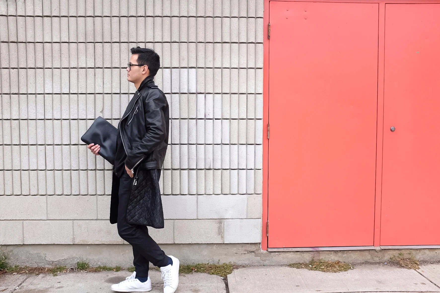 Clutch: Givenchy, Leather jacket: Acne Studios, Under jacket: Maison Martin Margiela, Sweater: Alexander Wang, Pants: Kit & Ace, Shoes:Adidas