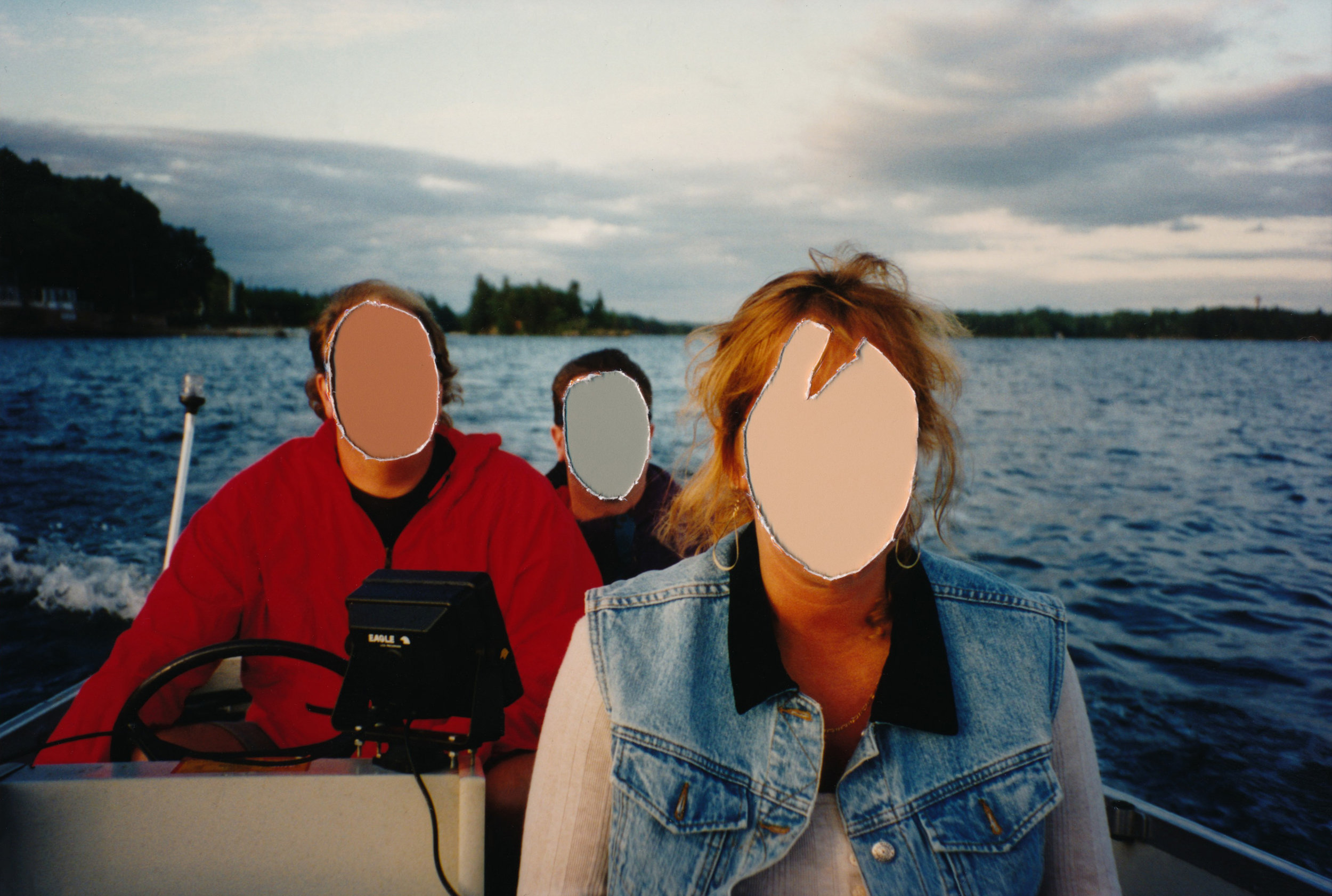 Mom and dad with a friend boating on Canadian waters, 1994