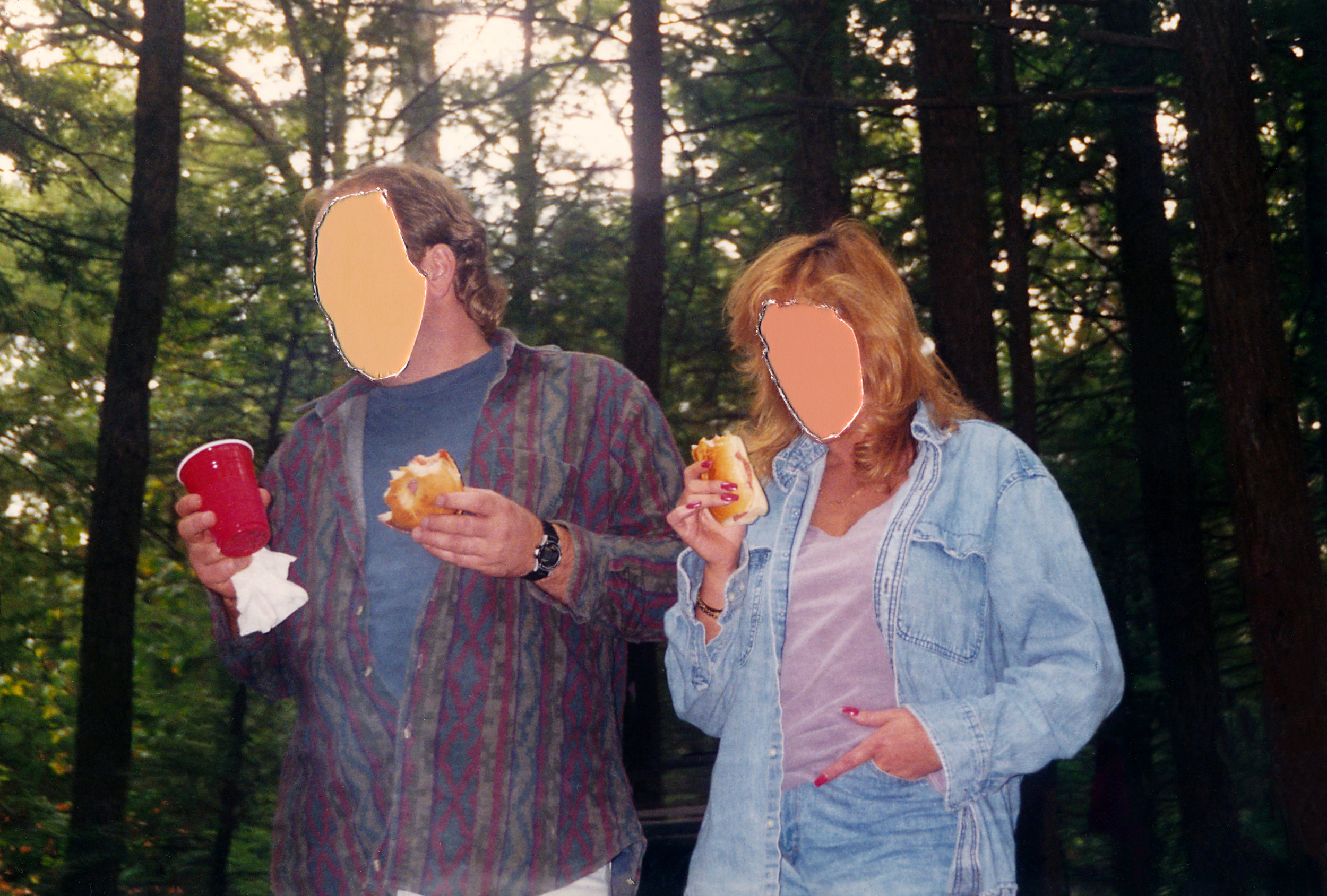 Mom and dad eating sandwiches on a camping trip, 1994