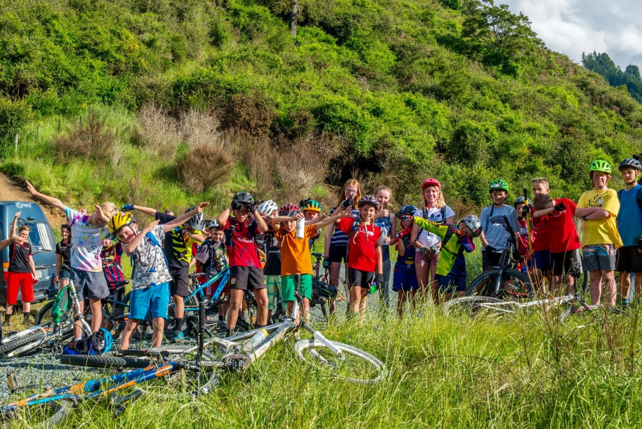 Feeling the flow? Or warming up for trail maintenance? The groups of six combine for a shared skills session.