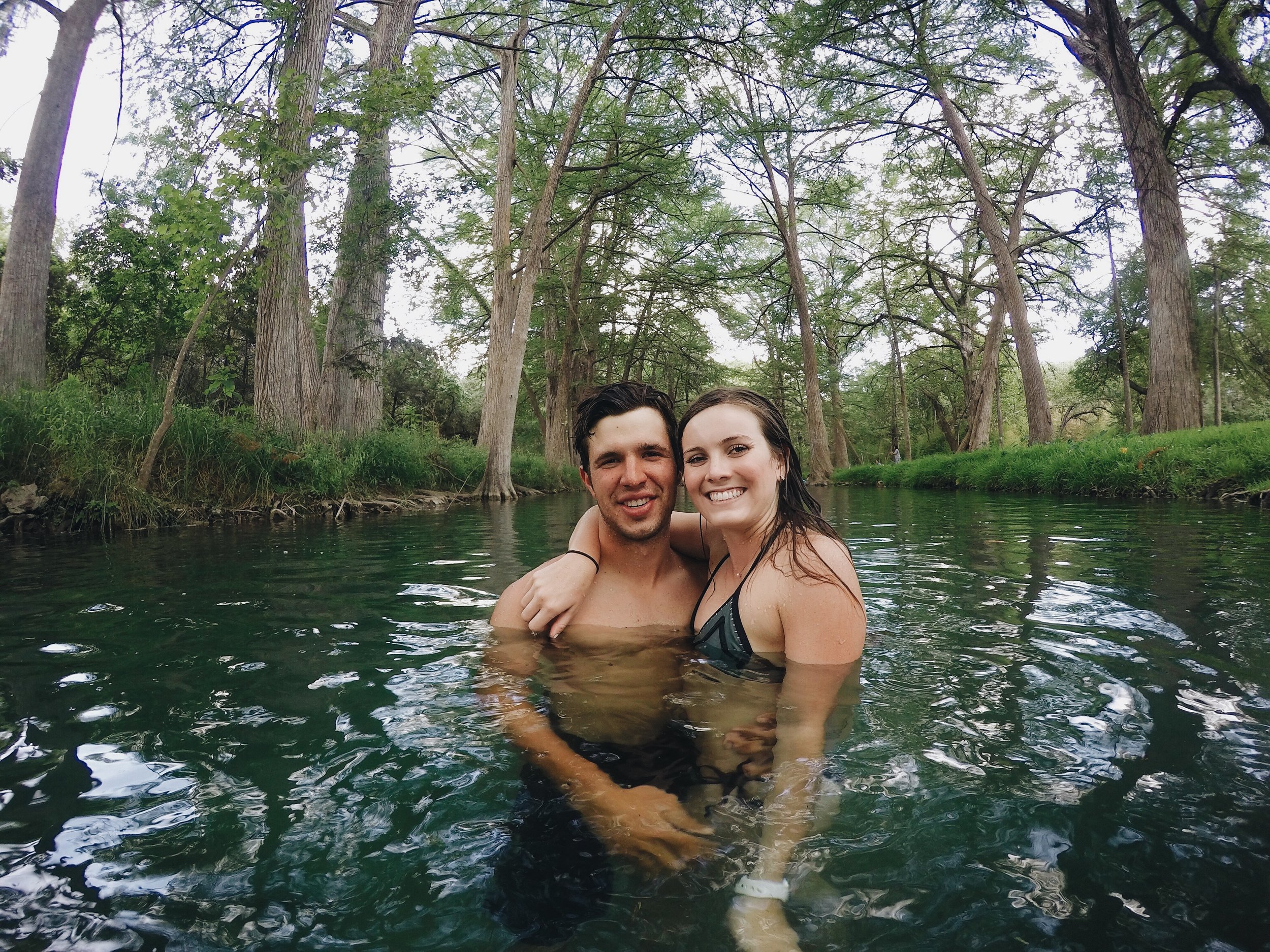 Beautiful swimming hole lined with Cypress trees in Wimberley, TX.
