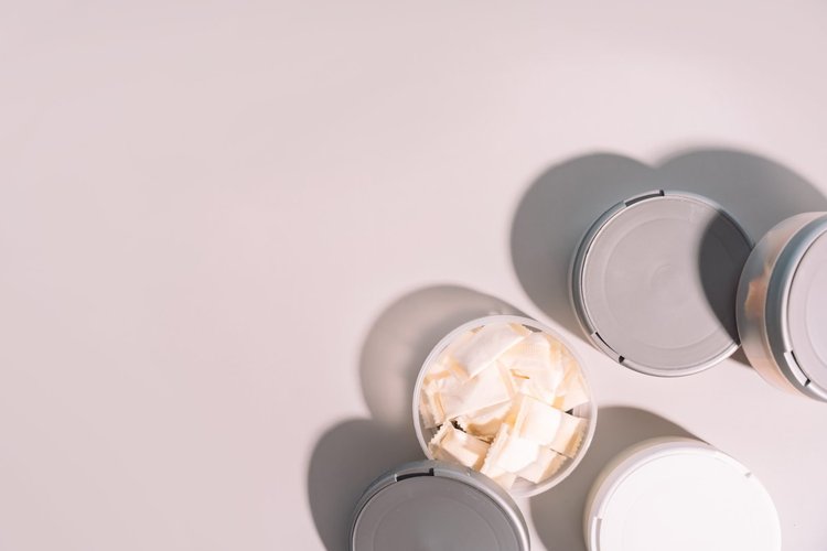 Open tins of nicotine pouches