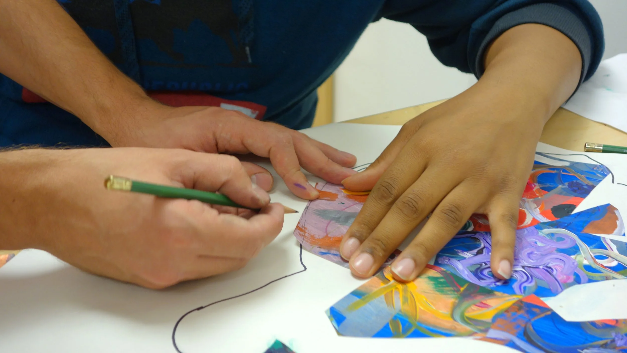 students working hands.JPG