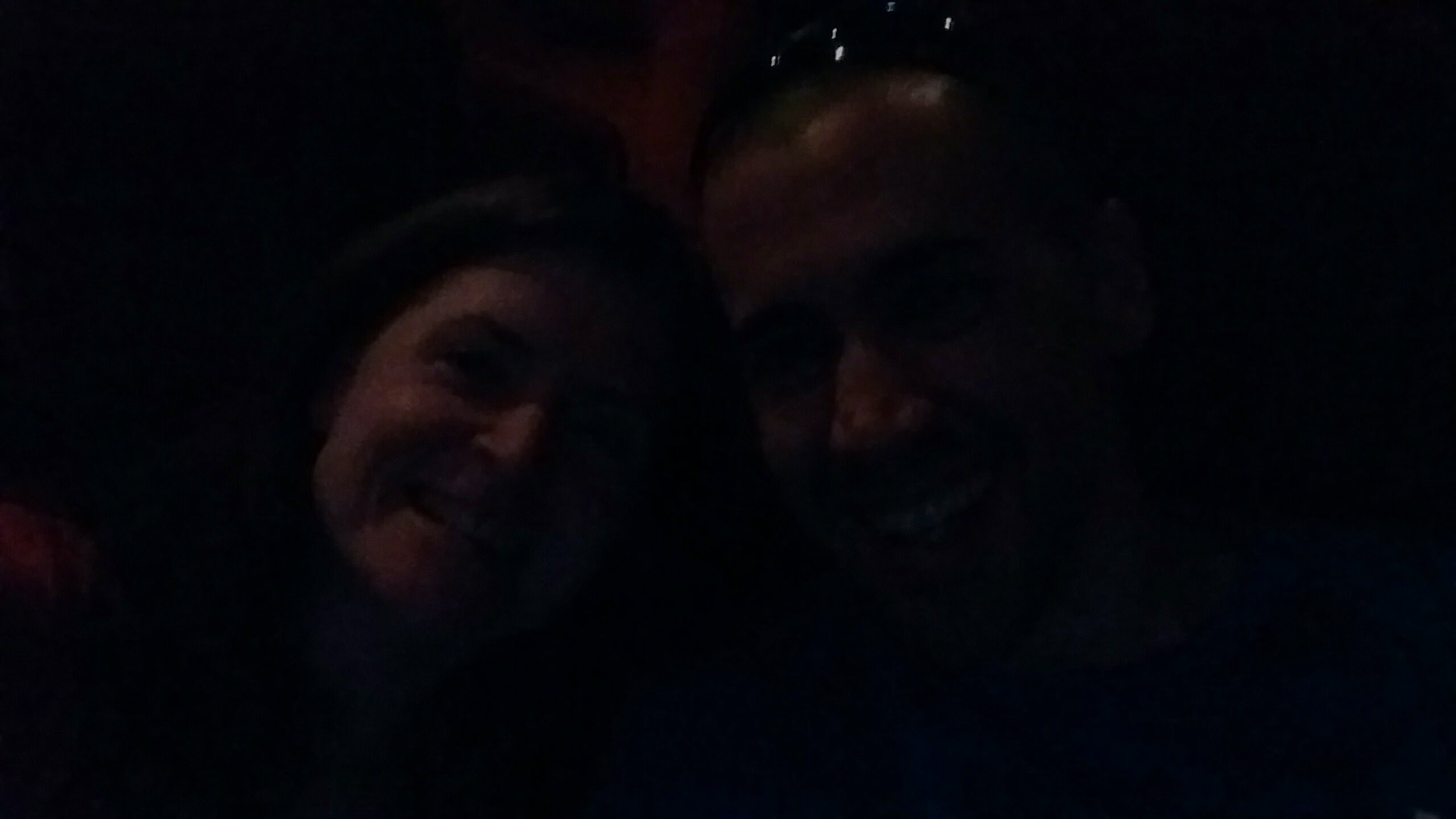 I don't know how well you can see this photo, but these are our happy faces. We managed to also have a babysitter scheduled for the night the loan funded. Here's us bursting with happiness right before the new Bourne movie starts.
