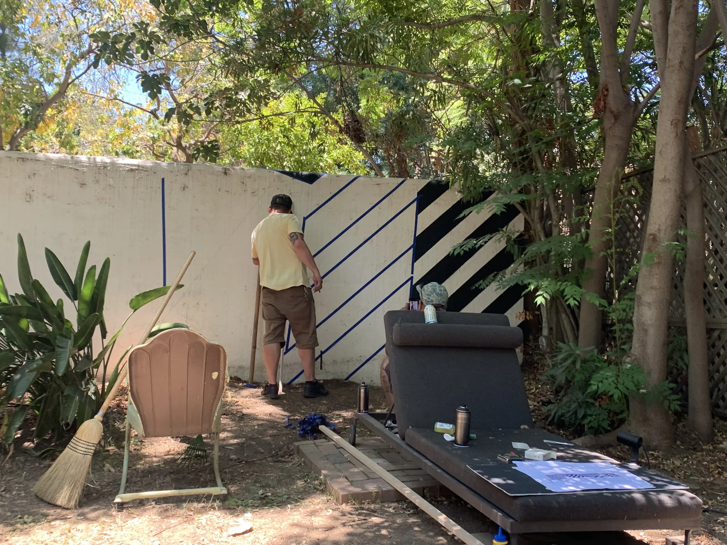 Kyle painting razzle dazzle wall 1.jpeg
