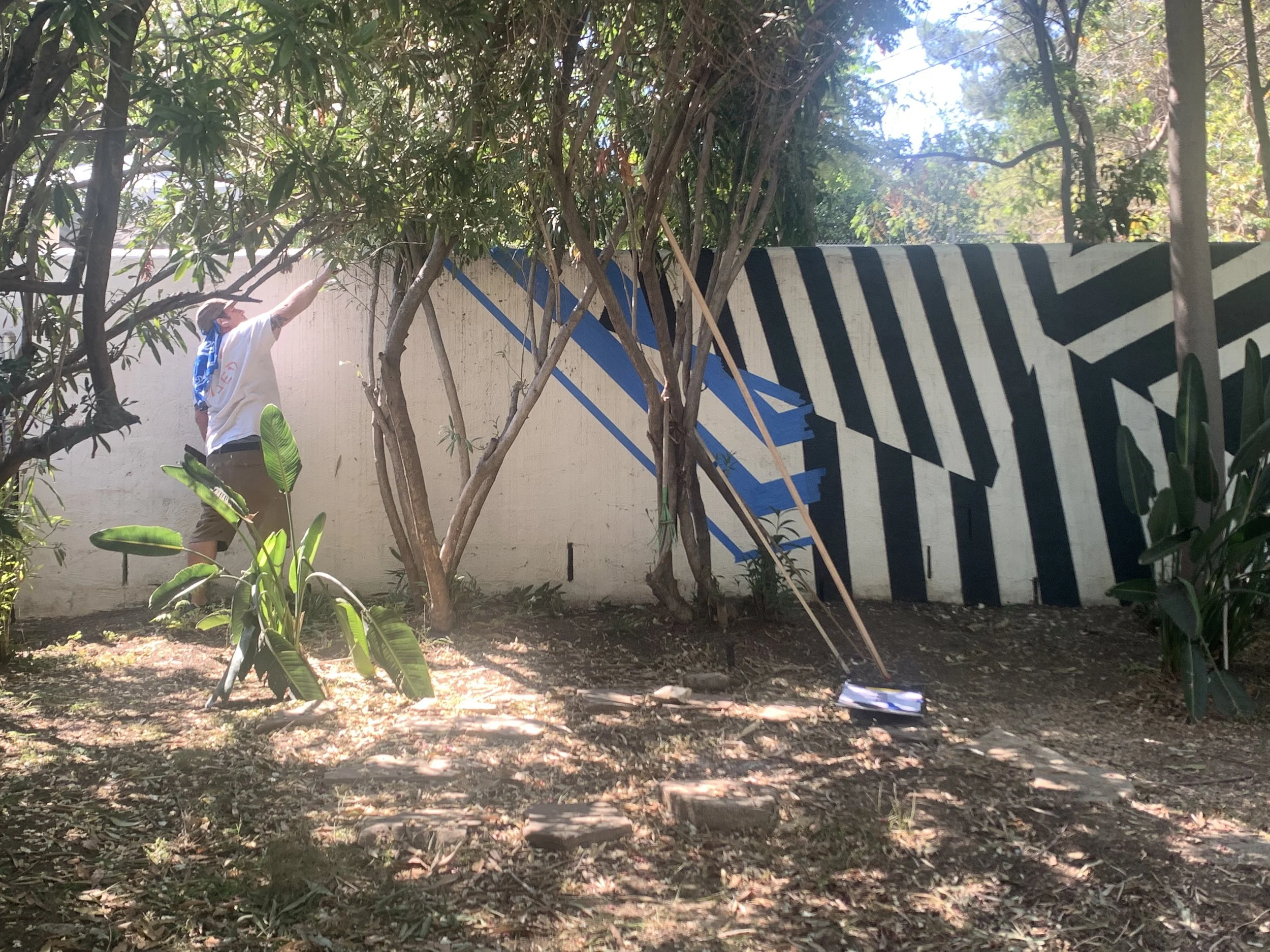 Kyle painting razzle dazzle wall 3.jpeg