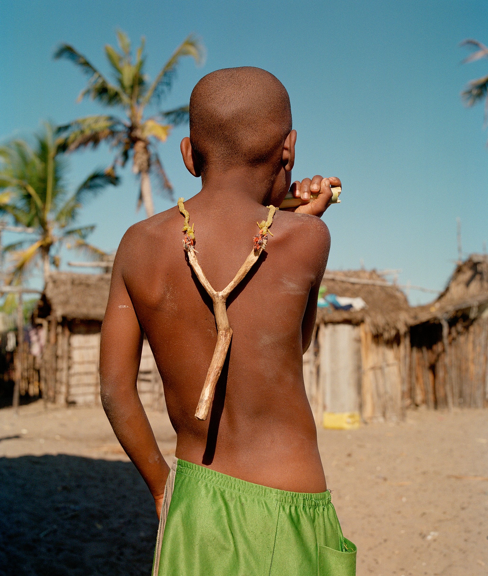  A Young Boy with sugar cane and catapult, Madagascar  Part of a collection of images for WWF that form part of project on the communities that are safe guarding the precious mangroves of East &amp; Southern Africa.     
