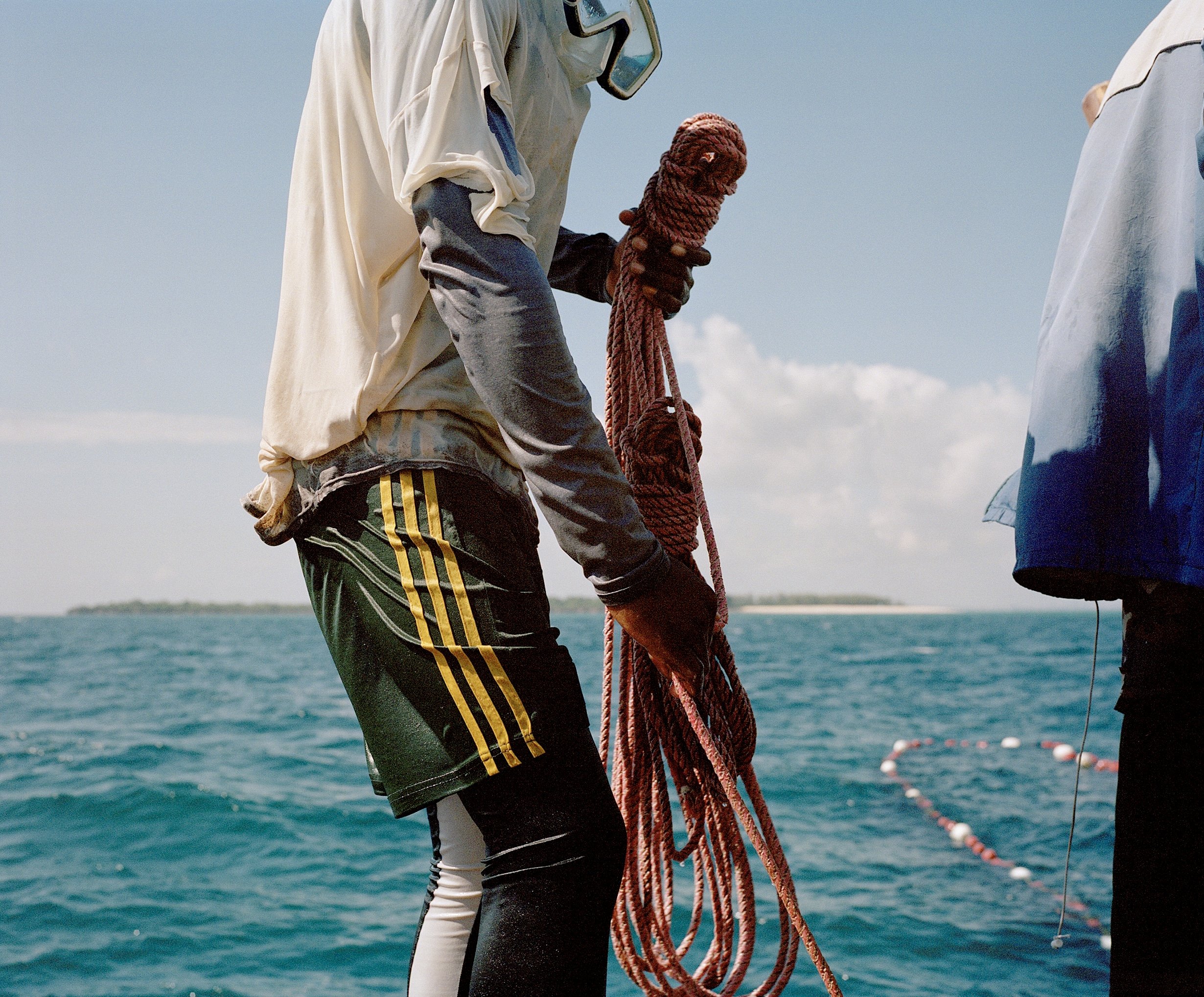  Fisherman Dar Es Salaam  Part of a collection of images for WWF that form part of project on the communities that are safe guarding the precious mangroves of East &amp; Southern Africa.  