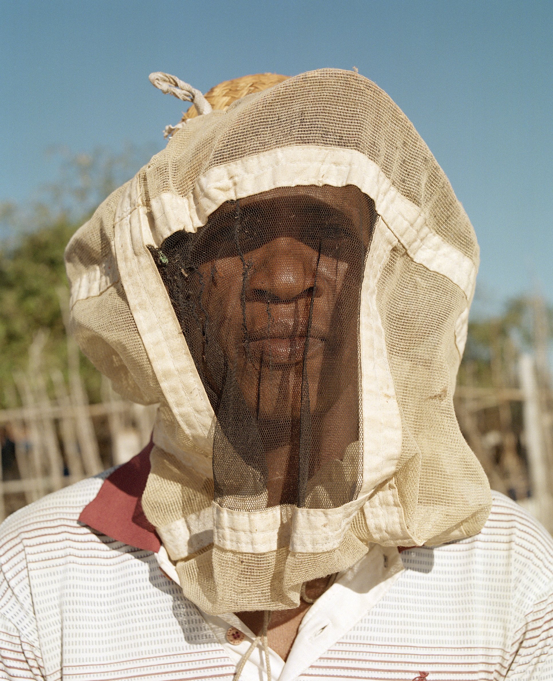  Beekeeper, Mozambique   Part of a collection of images for WWF that form part of project on the communities that are safe guarding the precious mangroves of East &amp; Southern Africa.  