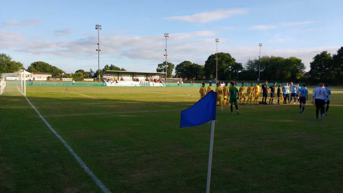Teams are out (spot the newly painted stand and netting over the railings!)