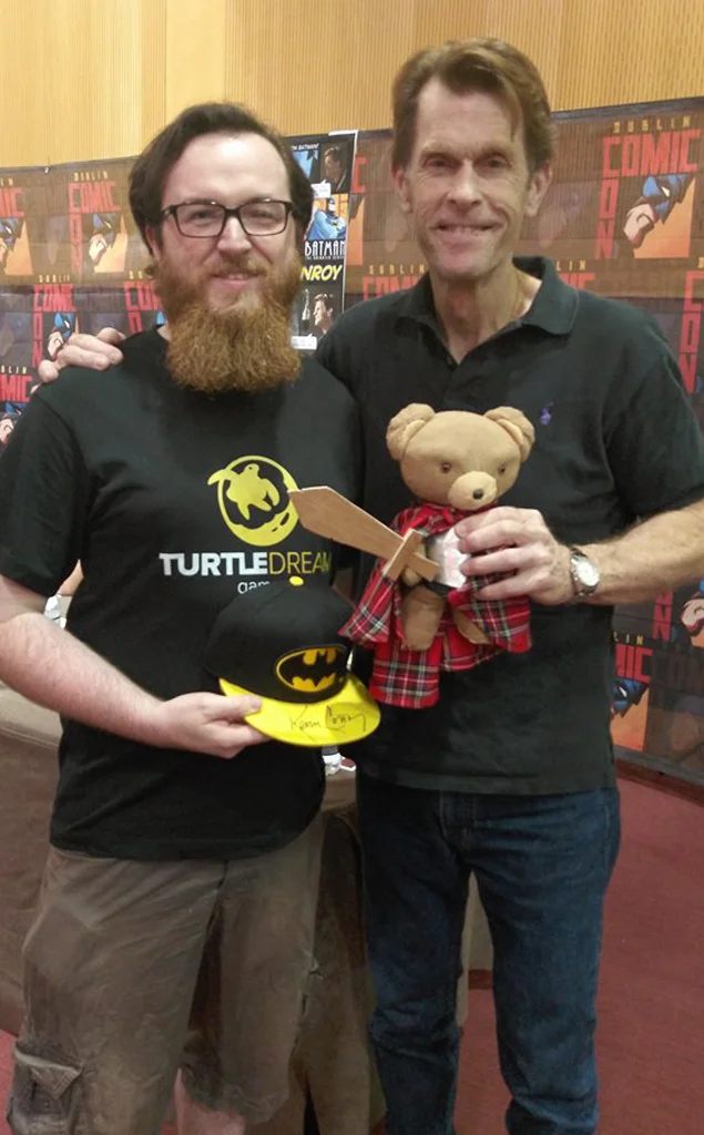 (Disclaimer: Kevin Conroy was aware that Theodore was being used to promote a project on Kickstarter before taking the photos and was fine with that; but he is in no way endorsing or affiliated with us or with Dare to Dream. Also, he is a really excellent guy in person and will talk to you in his Batman voice unprompted to get a laugh.)