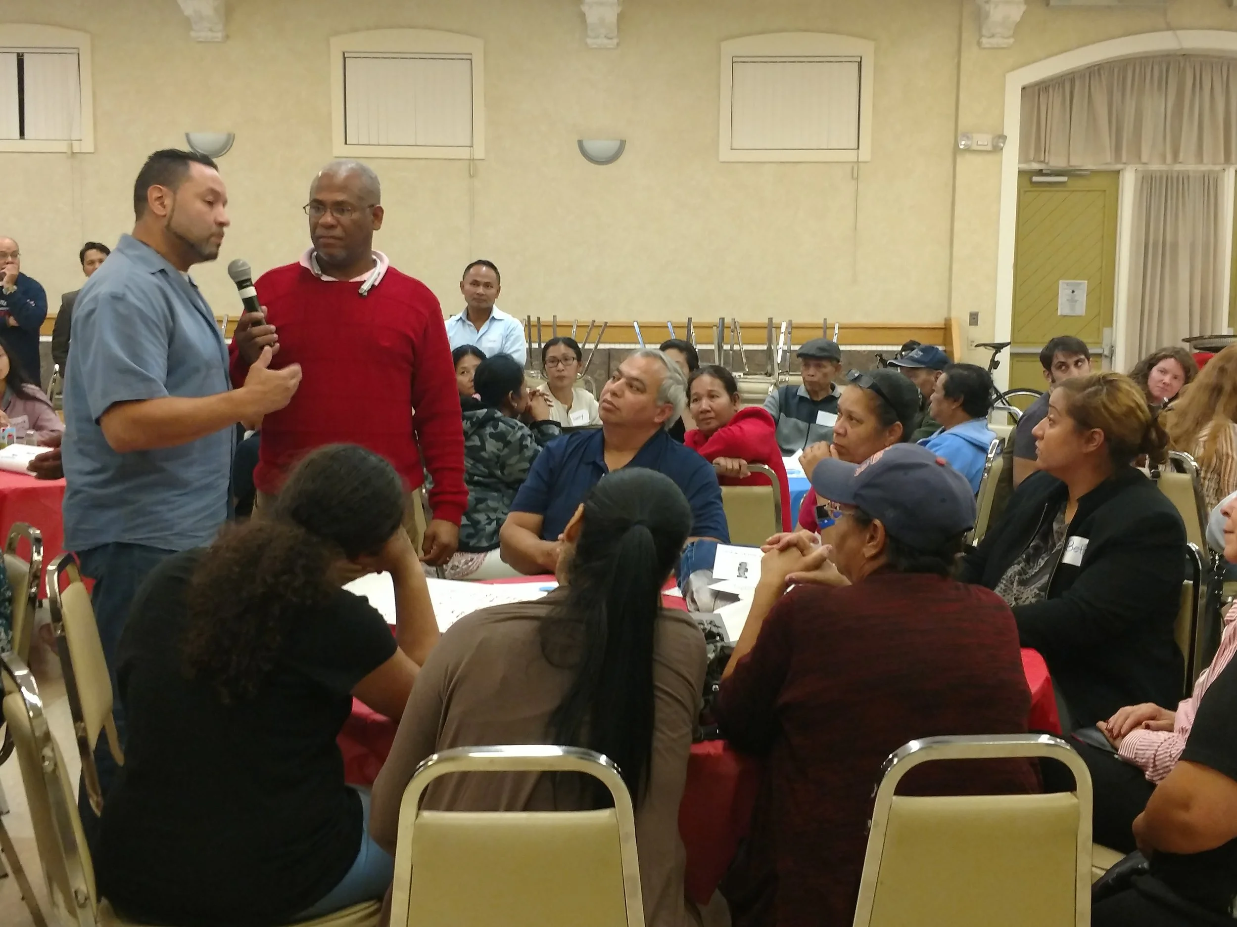 Residents gather to discuss Lowell's current voting system and the voting rights lawsuit filed against the city.