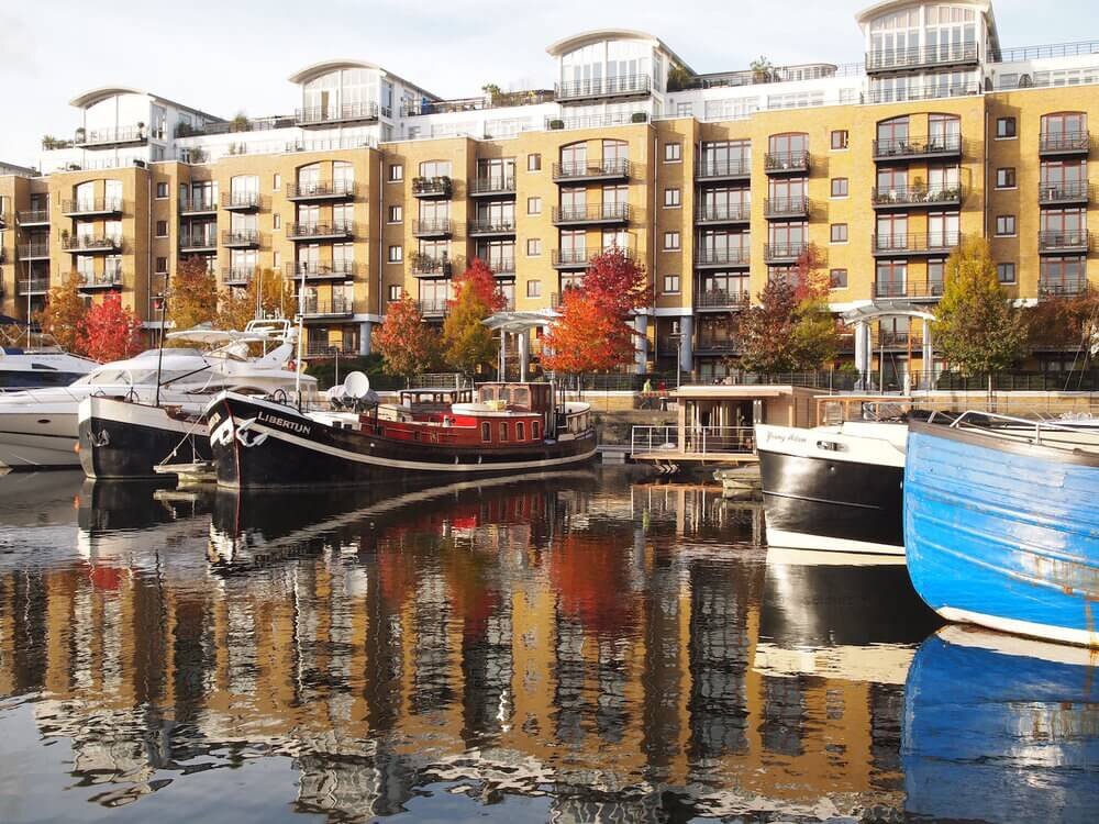 Floating House Surrounded by Big Boats.jpg