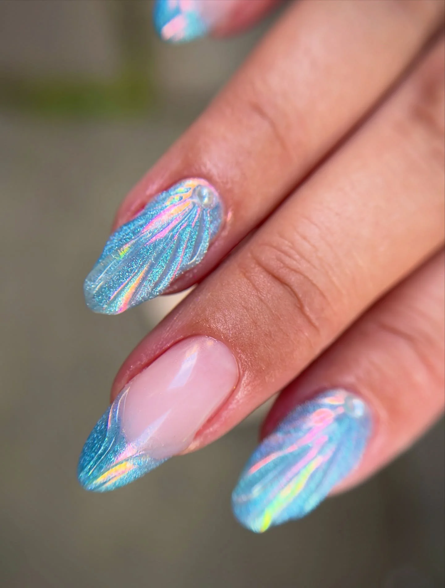 🩵🐬💦 

Loving the iridescent vibe of this holiday set by #selfish_helly ✨. 

Book for category 3 to get this look. 
.
.
.
.
.
.
#nailartspitalfields #nailarteastlondon #nailartshoreditch #ukranianmanicurelondon #holidaymani #hi#olidaynails #maldive
